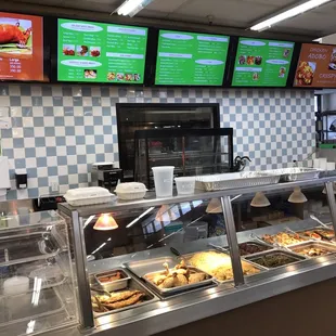 Heated table with menu board for ordering off the table items that are cooked when ordered.
