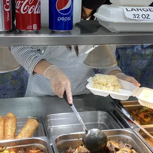 a woman serving food