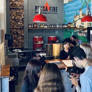 a group of people in a restaurant