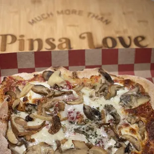 a pizza in a pizza box