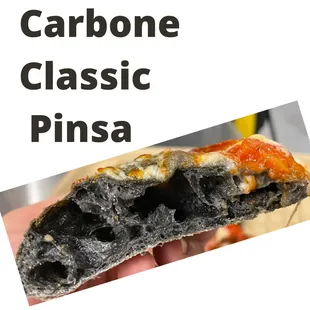 a close up of a piece of pizza