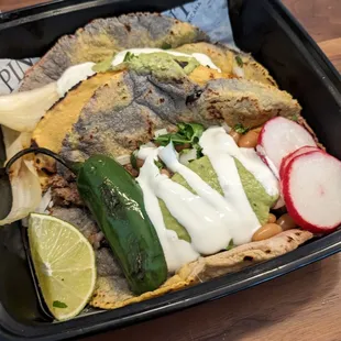 Pintos tacos (al pastor and carne asada)