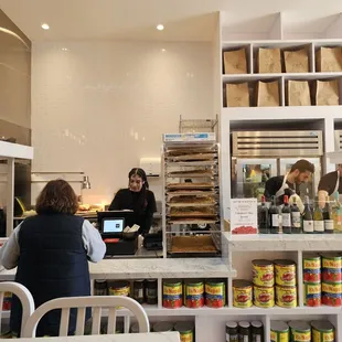 a woman behind the counter