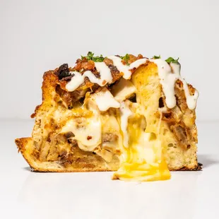 a piece of bread with melted cheese