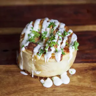 a pastry with icing and toppings