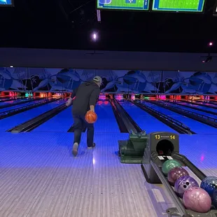 a man in a bowling alley