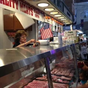 a woman behind the counter