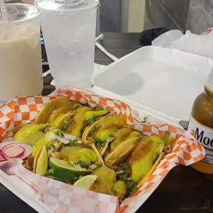 Onion &amp; Cilantro, Red &amp; Green Salsa, Guacamole, Radish, Lime, Horchata and Modelo