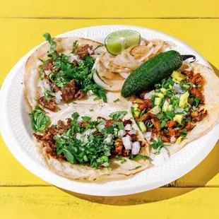 a plate of food on a yellow table