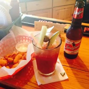 Yummy lunch at Pioneer Bar...  Bloody Mary&apos;s and cheese curds :)