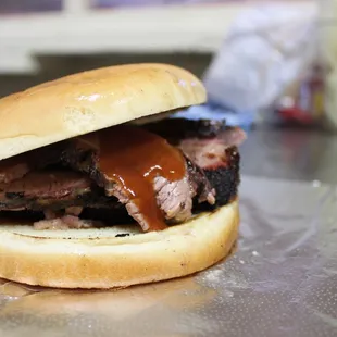 a pulled pork sandwich on a bun