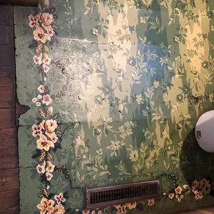 What appears to be the original flooring in bathroom; so cool!