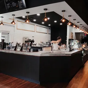 a woman working behind the counter