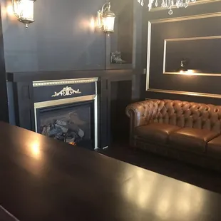 Lovely couch and fireplace!