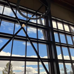 a large clock hanging from the ceiling