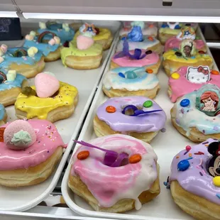 a variety of decorated donuts