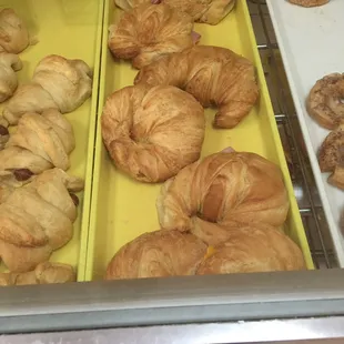 Buttery, flaky croissant ham/cheese sandwiches and sausage rolls...so friggin good!