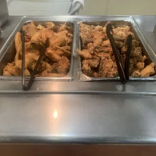 the food being served in the buffet