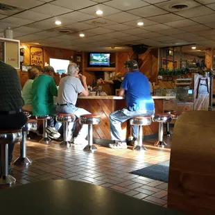 At the counter.