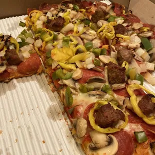 &quot;All the Way&quot; Pizza. Half gone cuz we started in the car on the way home.
