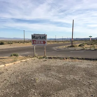 a stop sign in the middle of the desert