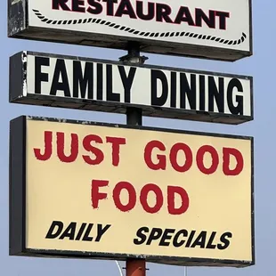 a family dining just good food sign