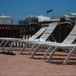 lounge chairs by the pool