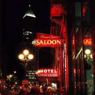 neon signs on the side of the building