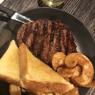 Ribeye and sidewinder fries (curly steak fries)
