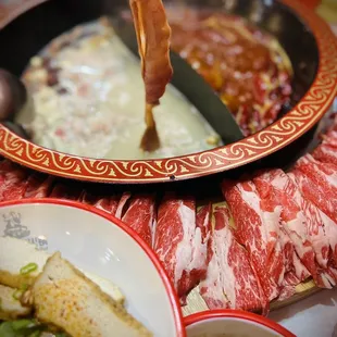 a plate of food with chopsticks