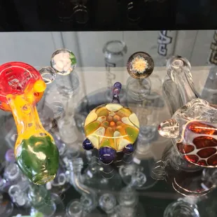 Locally made pipes pendants and marbles