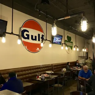 customers sitting at tables in a restaurant