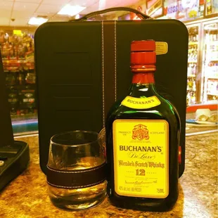 a bottle and a glass