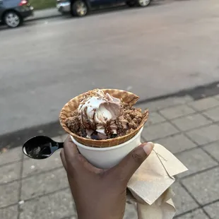 Waffle bowl with swirl ice cream with cookie dough