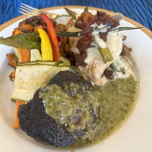 The entree - steak and chicken with sweet potato hash and roasted vegetables