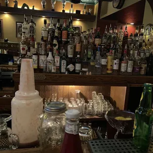 a bar filled with liquor bottles