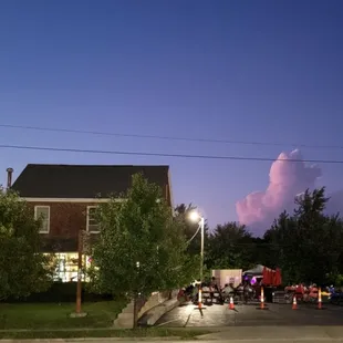 a group of people in a parking lot