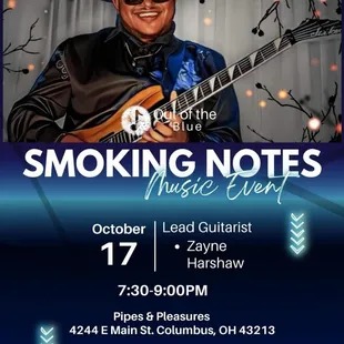 a man playing a guitar