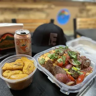 Lomo Saltado, Chaufa Peruvian Fried Rice, y Baked Plantains