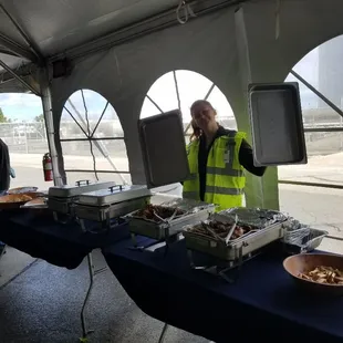 Setting up the buffet for an employee appreciation lunch in industrial West Sacramento