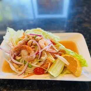 Spicy &amp; Sour Mango Salad top with Shrimps and Cashew Nut