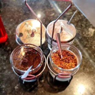 Assorted toppings, chili oil ans dry pepper