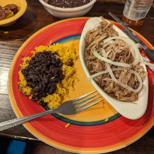 Roasted pork black beans and yellow rice