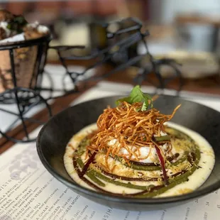 DAHI VADA CHAAT with papadi, sali potato, anar dana, mint garlic chutney, sweet sour and refreshingly herby