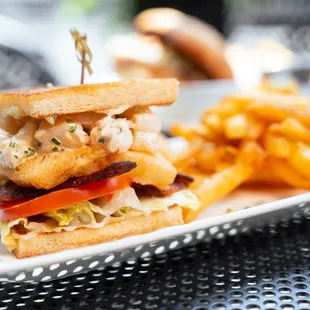 a crab sandwich and fries