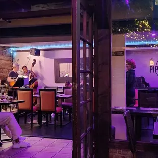 a couple of people in a restaurant