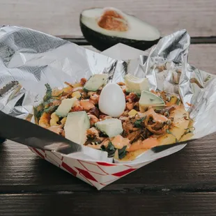 a plate of food on a picnic table