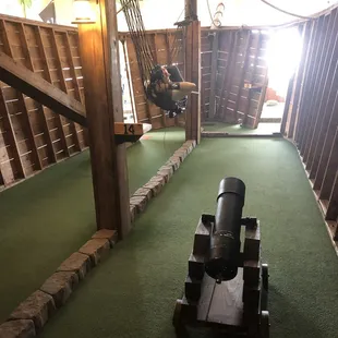 This hole has a cannon you shoot your ball out of