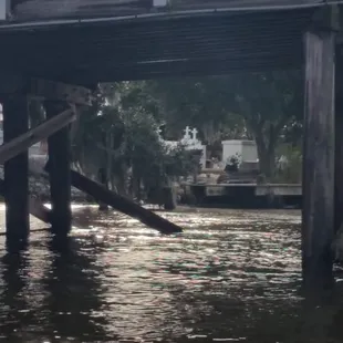 when we leave the dock you pass under Louisiana&apos;s worst bridge, and under it on the other side of the bayou is a creepy cemetery