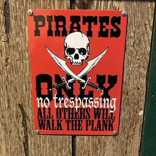 a pirate&apos;s only no trespassing sign